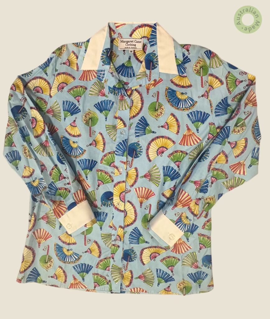 #204 – Light blue and multi colour fan printed for body, trims in cuffs,collar and inne