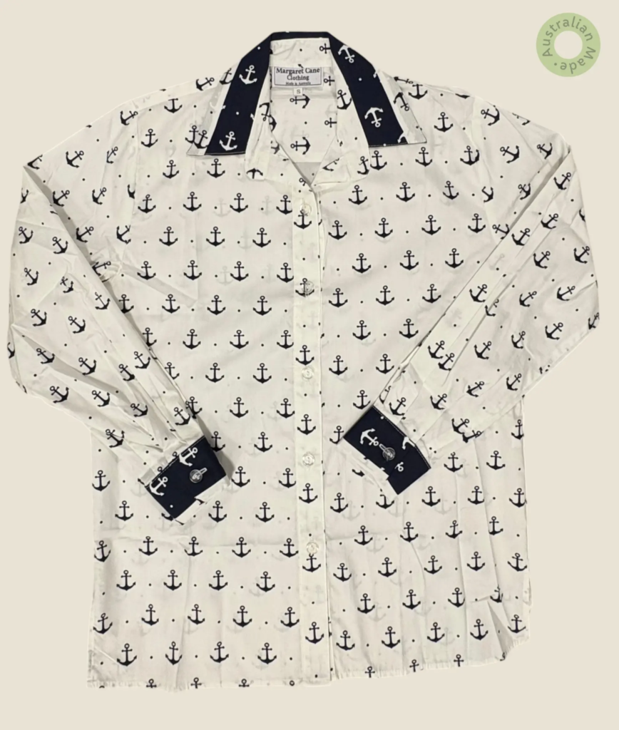 #208 – White base shirt featuring an all-over navy anchor and dot print. Complemented b