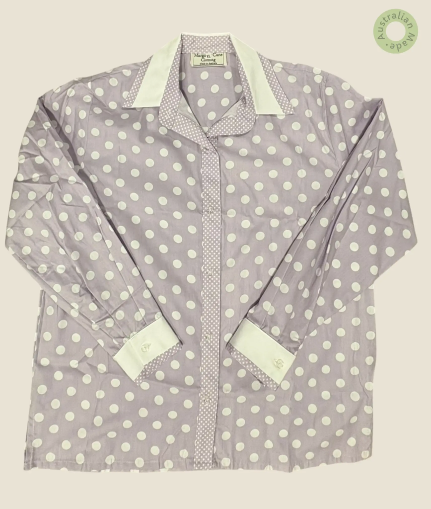 #211 – Lavender base shirt with an all-over white polka dot print, featuring a contrast