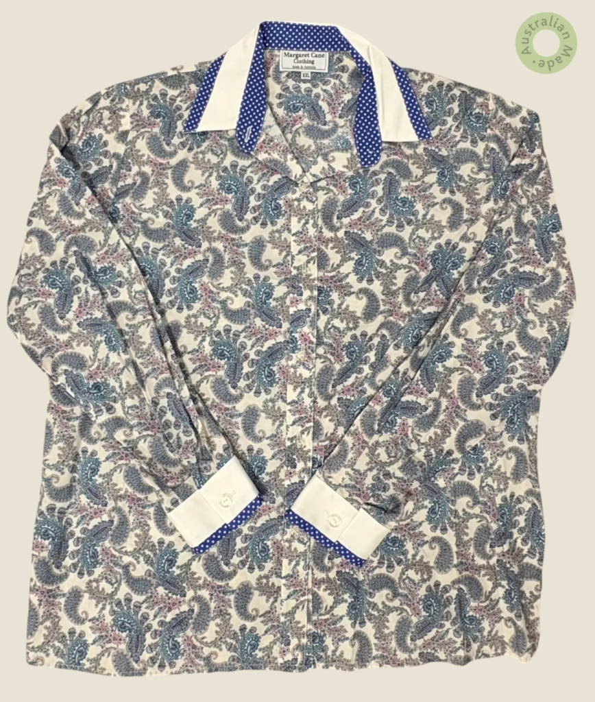 #212 – Cream base shirt featuring an all-over intricate paisley print in shades of blue