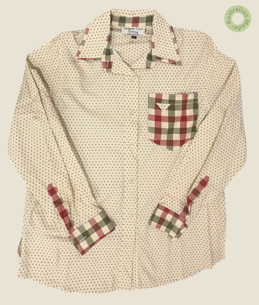 #131 – Cream base shirt with an all-over sage green polka dot print. Complemented by co