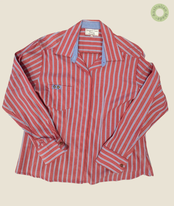 #551 – Terracota Red with thin vertical light blue and White stripes. Light blue fabric