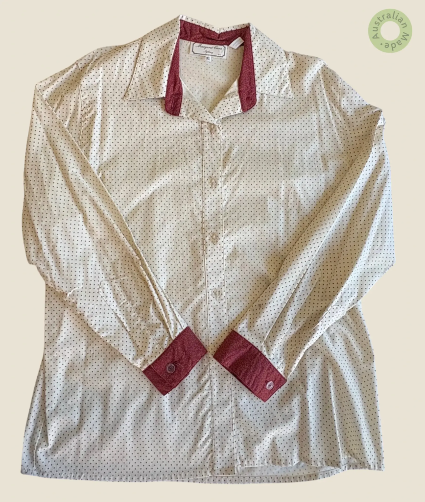 #408 – Cream base featuring a uniform maroon polka-dot print. The design is elevated by