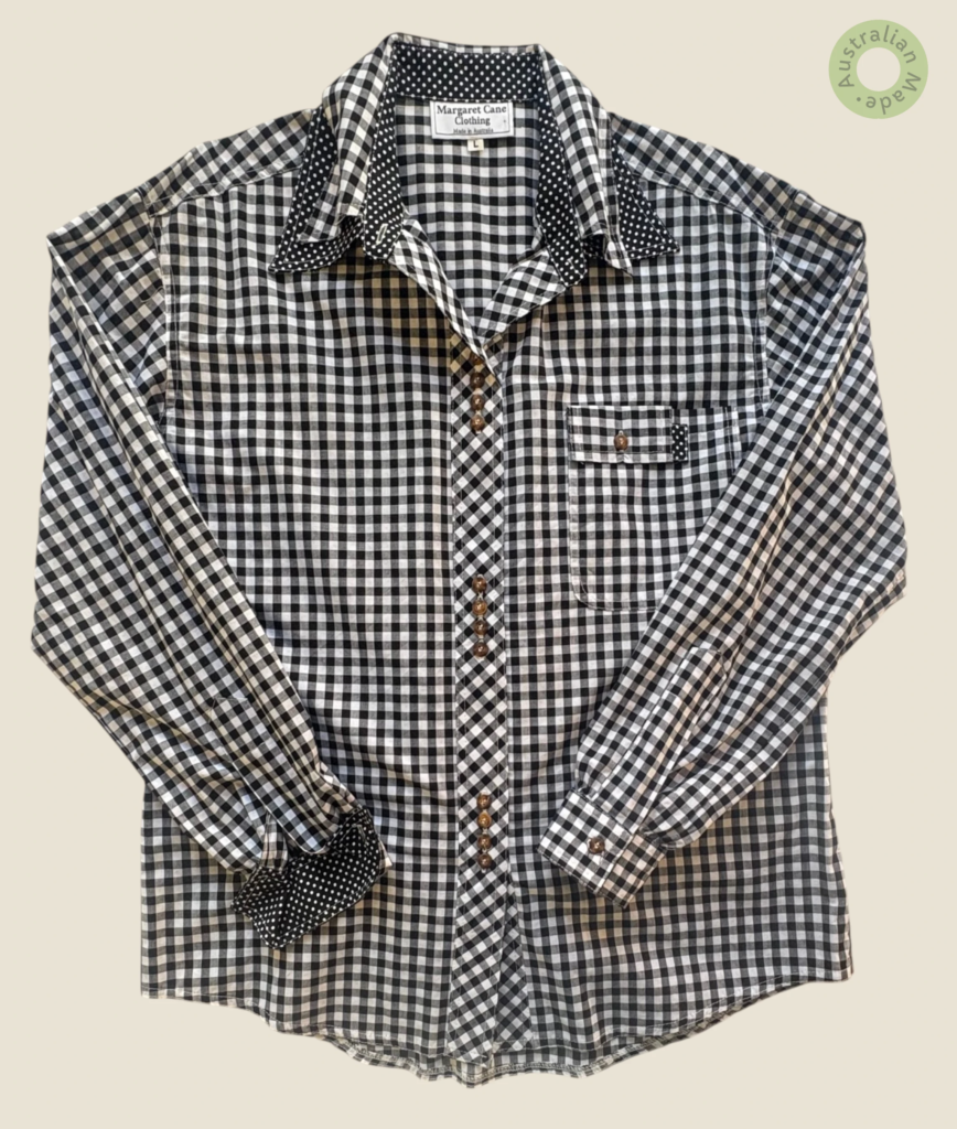 #109 – This shirt is crafted from a crisp, mid-weight gingham fabric in a classic black