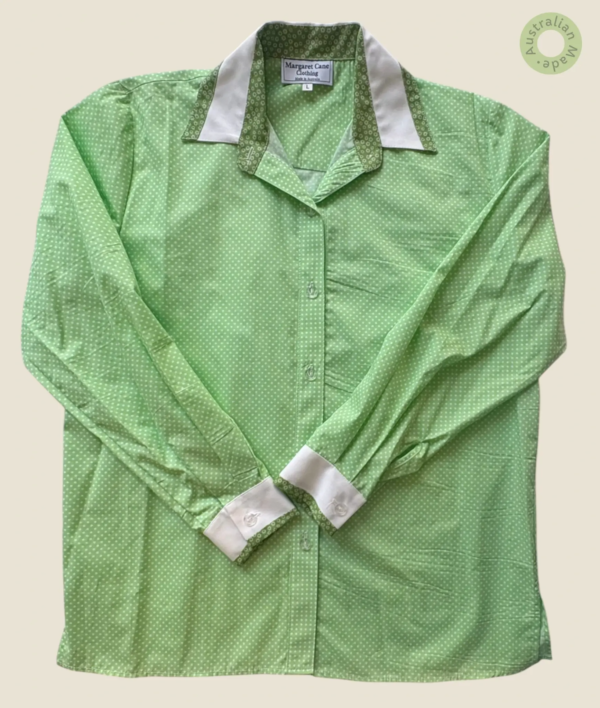 #225 – This shirt is made from a lightweight lime green fabric featuring an all-over wh