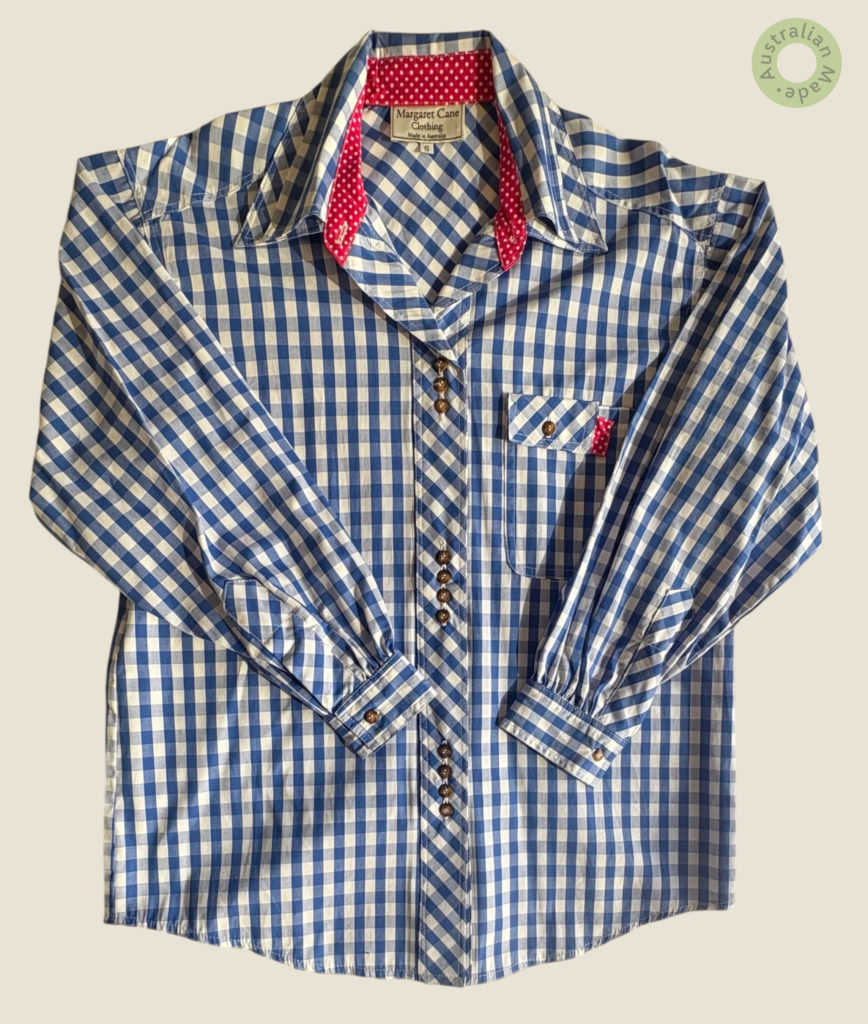 #111 – This shirt is crafted from a mid-weight gingham fabric in a classic royal blue a