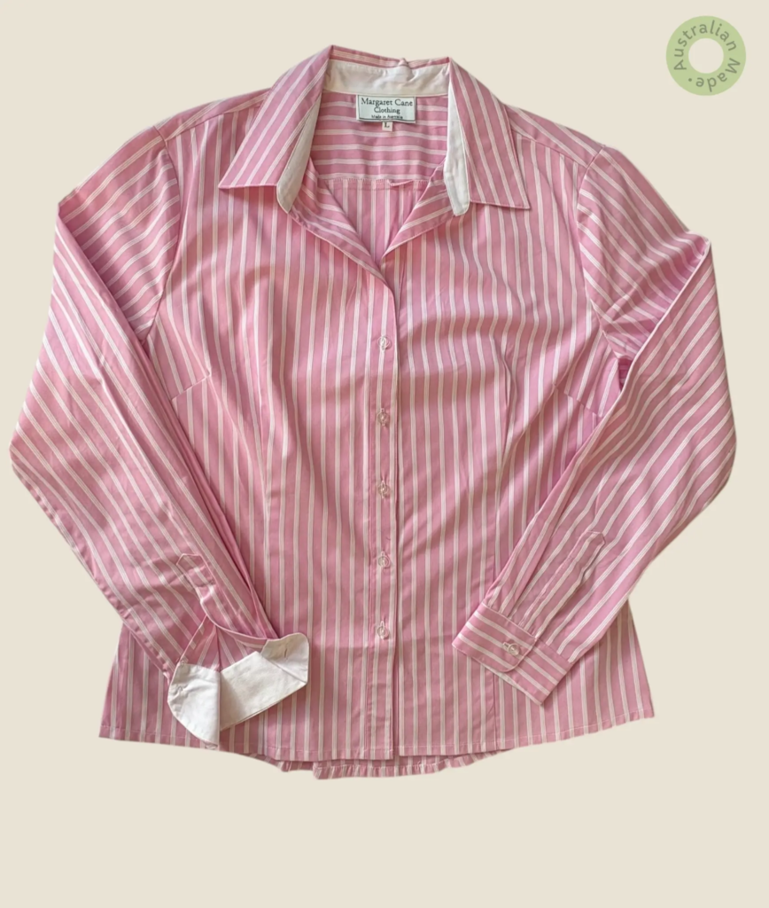 #502 – This shirt is made from a lightweight fabric featuring a classic pink and white