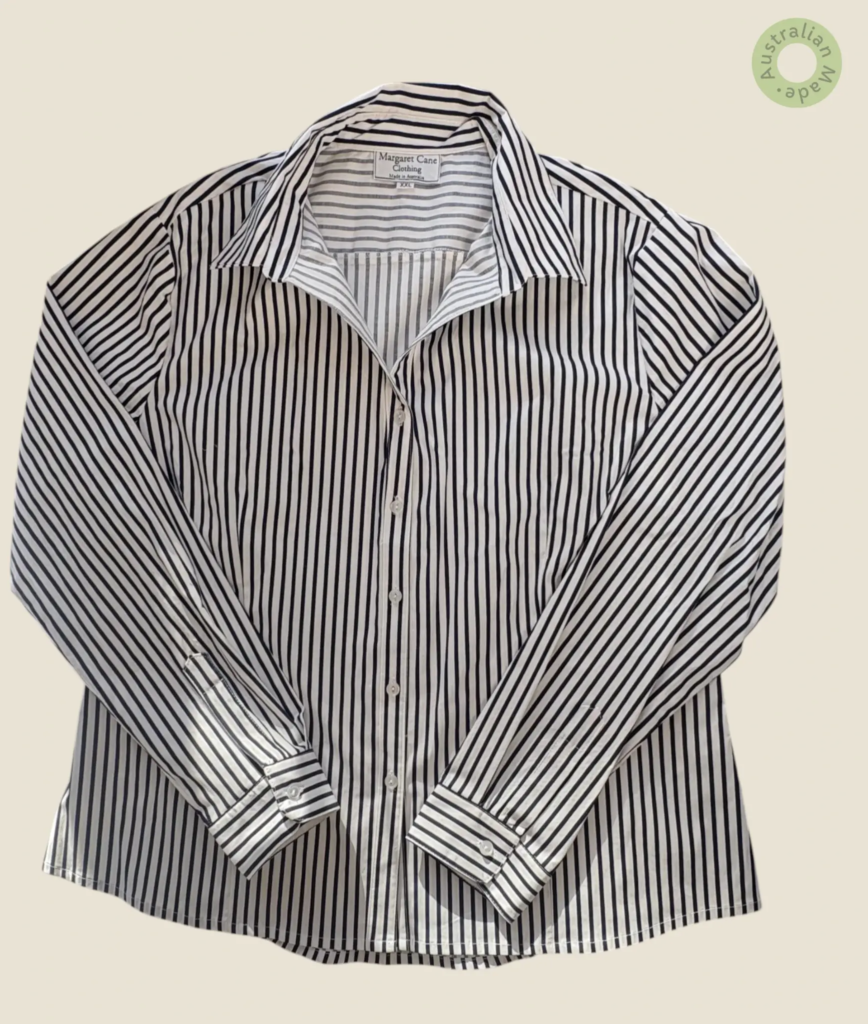 #506 – A classic professional shirt featuring a sharp black and white vertical stripe.