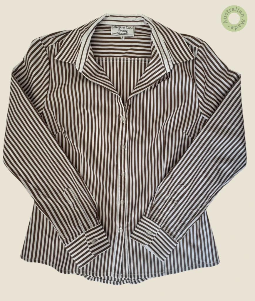 #503 – This professional shirt features a crisp chocolate brown and white vertical stri