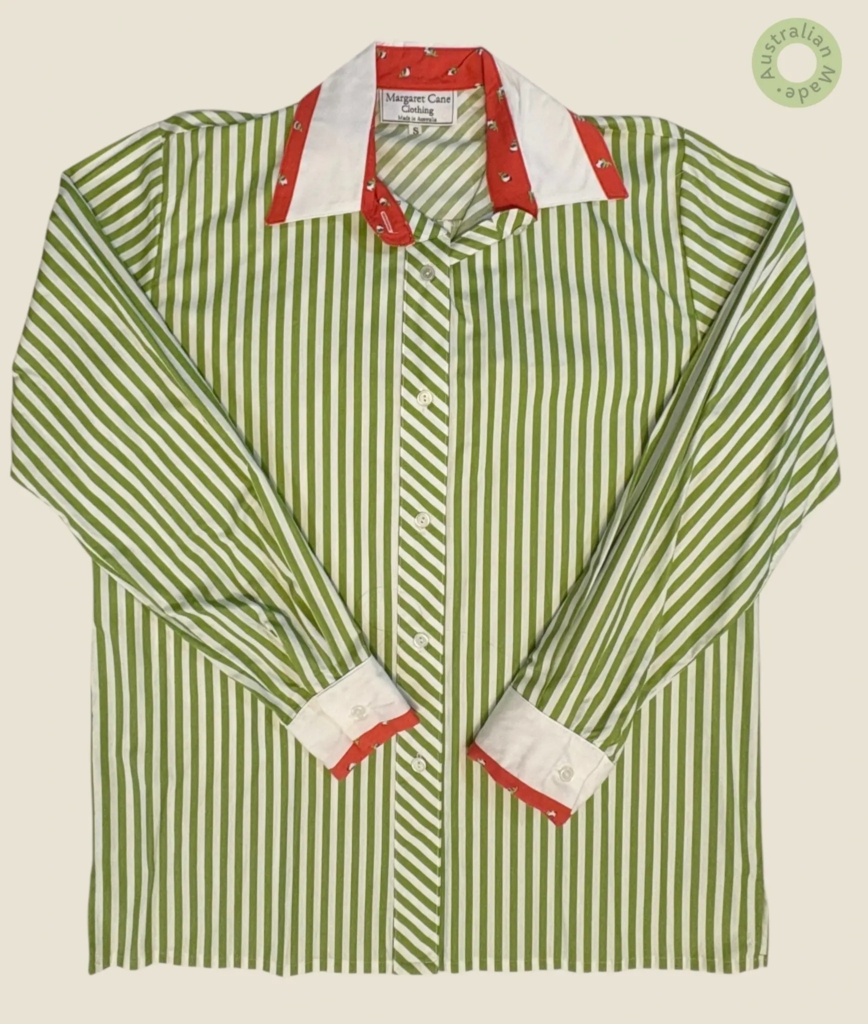 #231 – This shirt features an olive green and white vertical stripe. It is designed wit