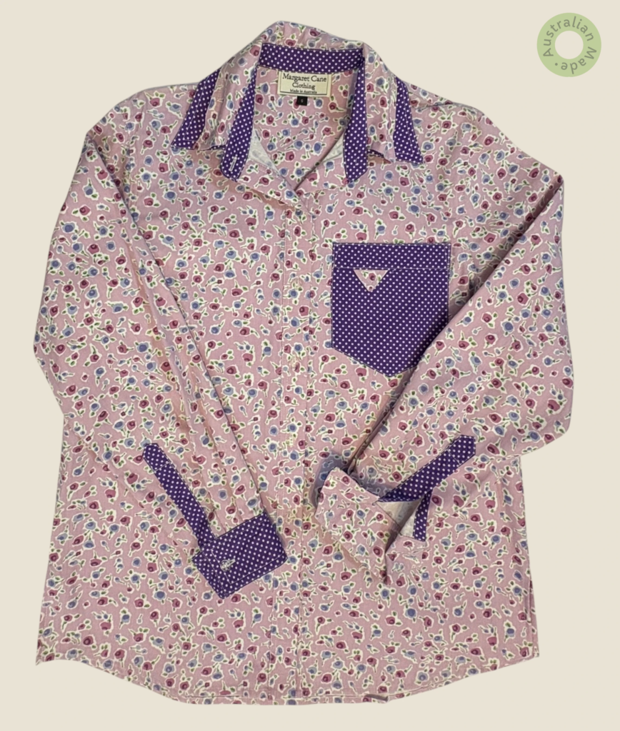 #117 – This shirt is crafted from a thicker cotton. It features a delicate mauve and bl