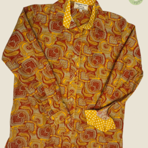 #411 – This shirt features an intricate all-over paisley print in shades of rust, ochre