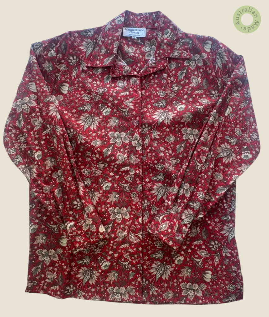 #413 – This professional shirt features an intricate, all-over floral and vine pattern