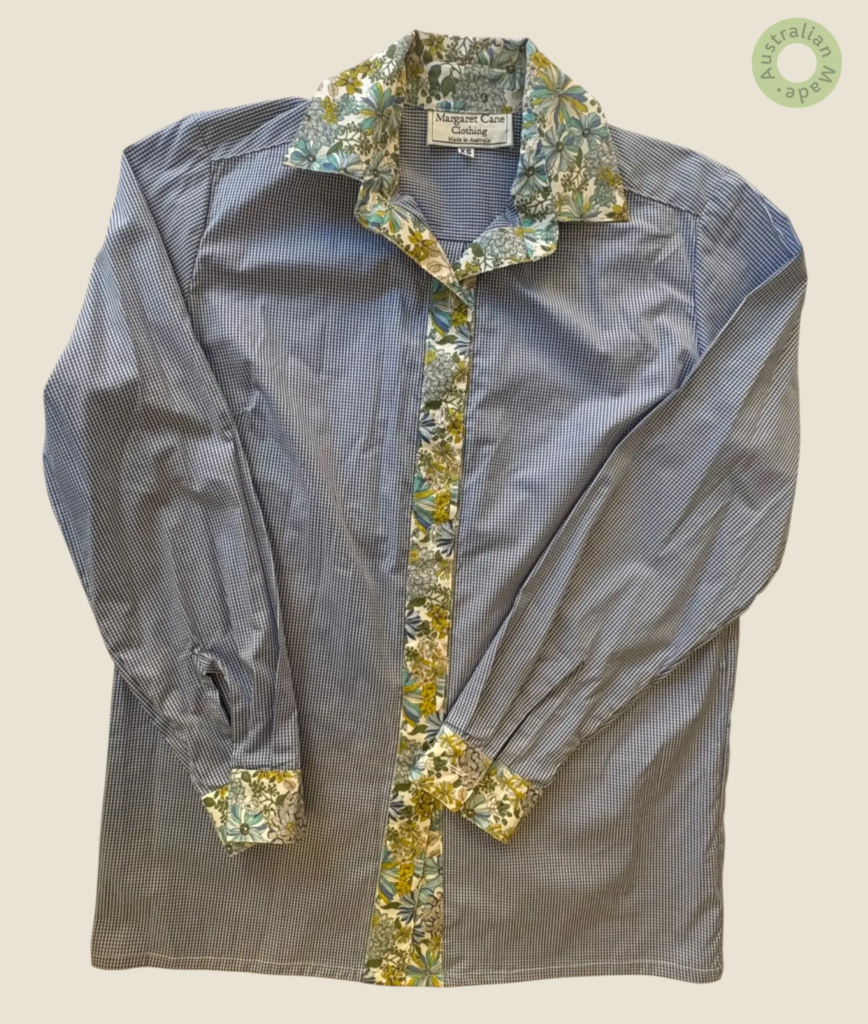 #414 – This shirt features a fine micro-gingham check in blue and white. It is distinct