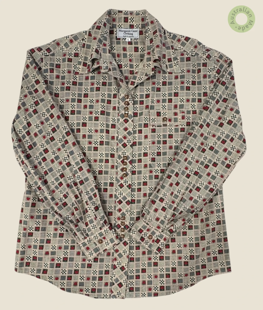 #128 – This professional shirt features a complex tiled pattern dominated by sage and a