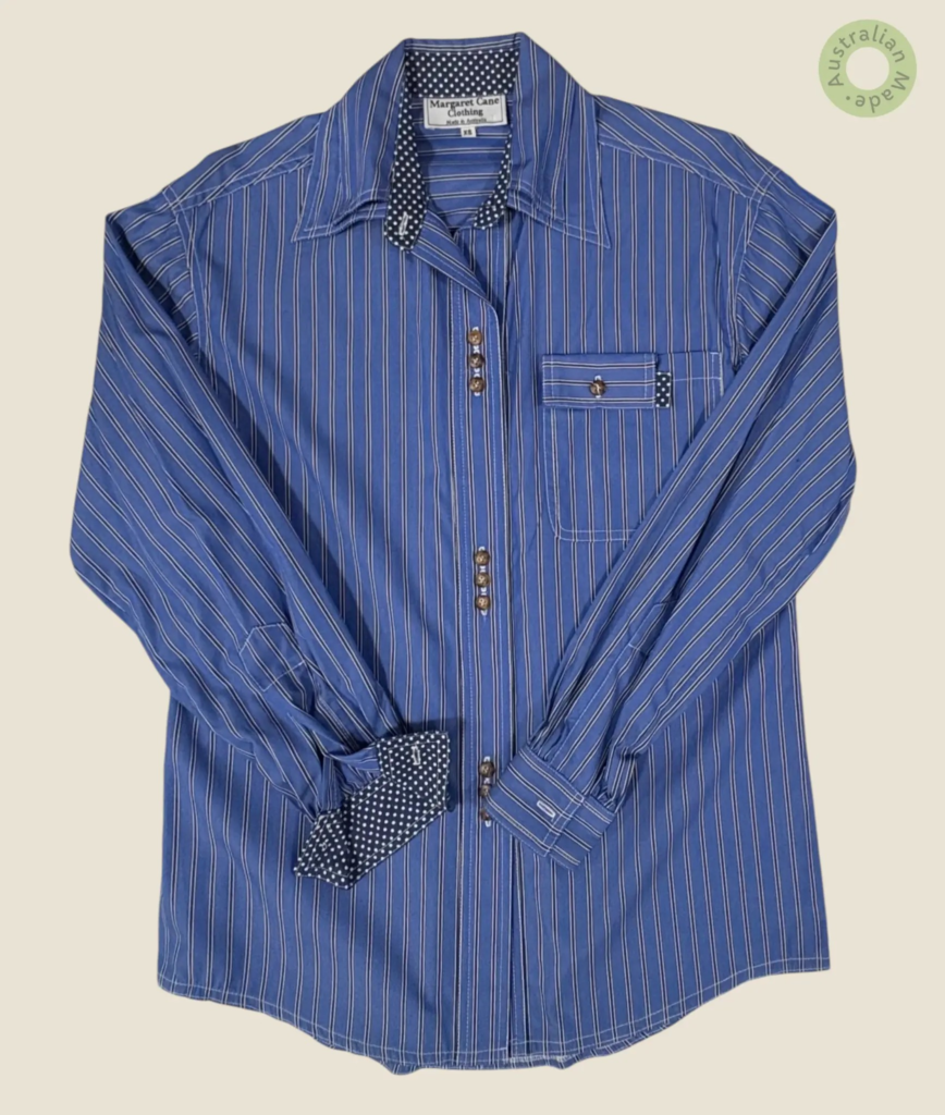 #127 – This professional shirt features a royal blue base with a vertical stripe patter