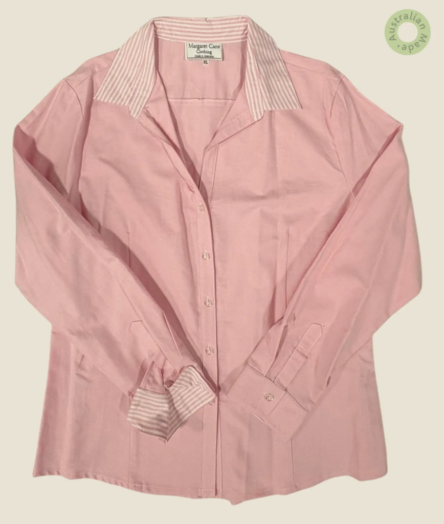 #507 – This shirt features a solid pink base for the body and sleeves. The outer collar