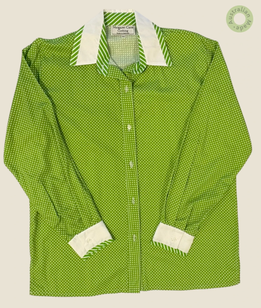 #247 – This shirt features a lime green base with a white polka dot pattern throughout