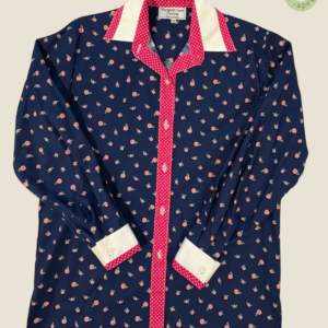 #233 – This shirt features a navy base with a pink rosebud floral pattern throughout th