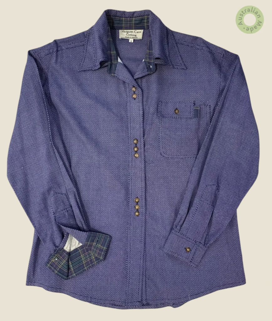 #133 – This shirt features a deep indigo and white honeycomb-style geometric pattern th