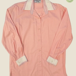 #248 – This shirt features a pink base with a small white polka dot pattern throughout