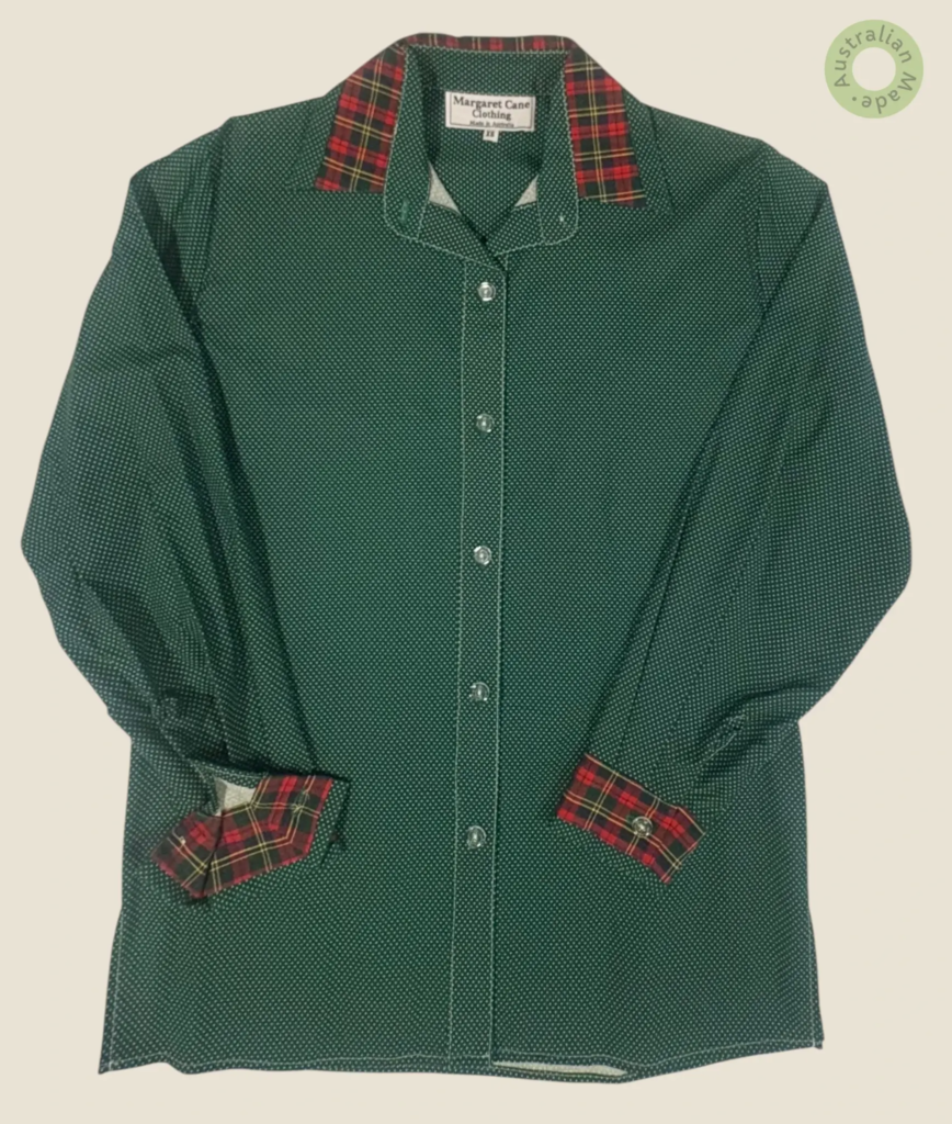 #253 – This shirt features a forest green base with a white micro-polka dot pattern thr