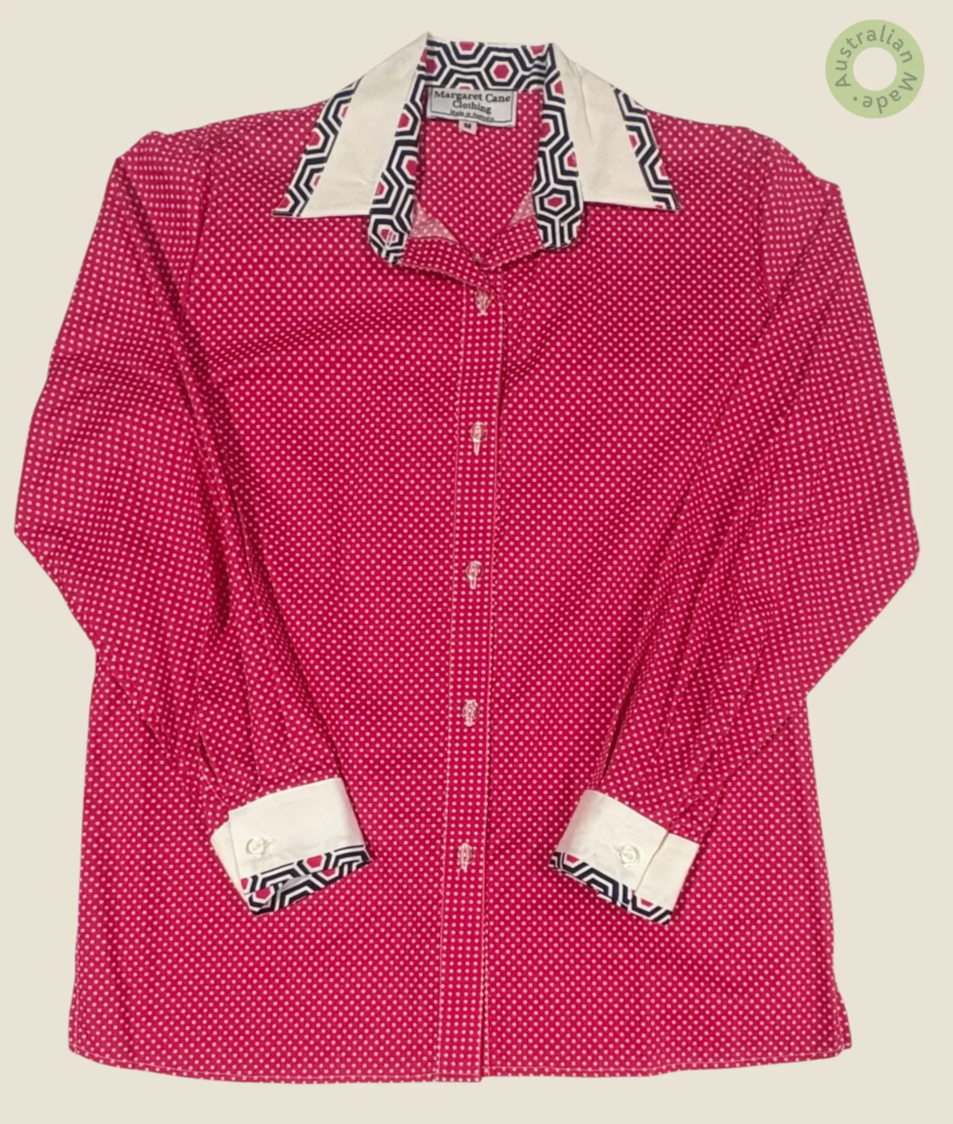 #254 – This shirt features a magenta base with a white micro-polka dot pattern througho