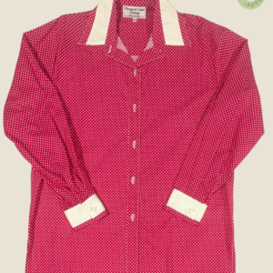#256 – This shirt features a pink base with a white micro-polka dot pattern throughout