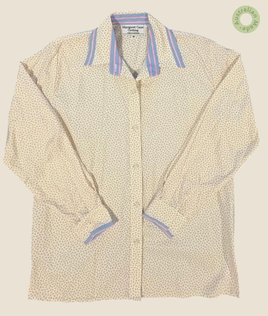 #261 – This shirt features a cream-colored base with a delicate, all-over micro-floral