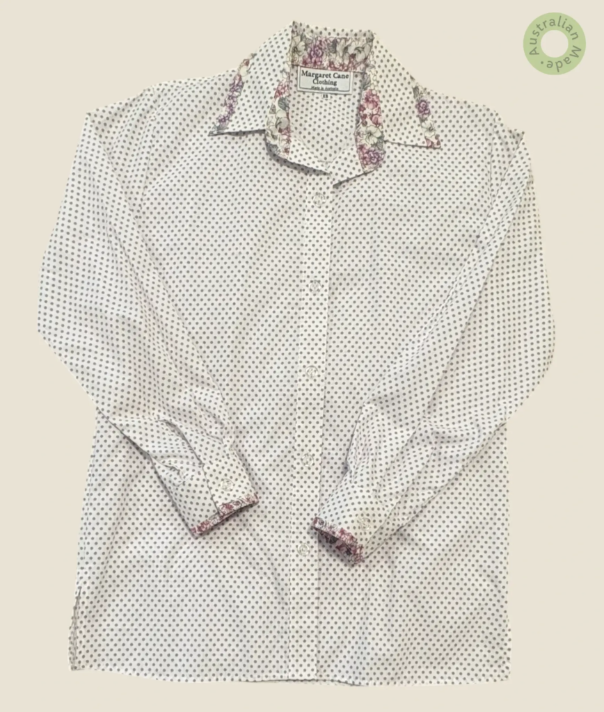 #266 – This shirt features a white base with a dense lavender micro-polka dot pattern a