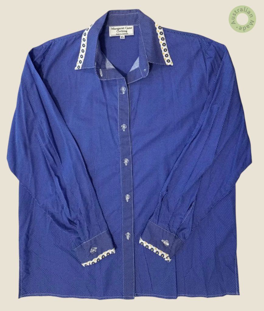 #272 – This shirt features a vibrant roval blue base with a dense white micro-polka dot