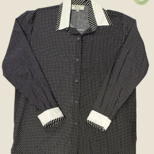 #282 – This shirt features a black base with a dense small white polka dot pattern thro