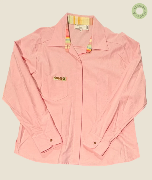 #553 – This shirt is made from a solid soft pink fabric throughout the body and sleeves