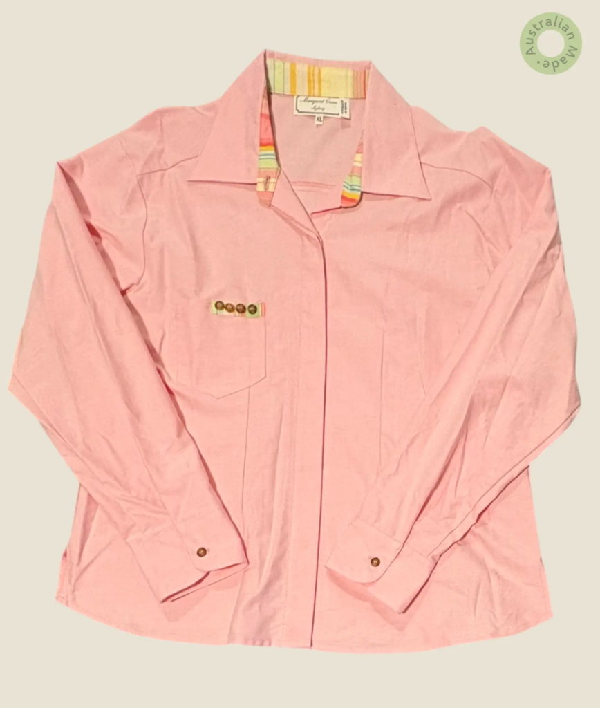 #553 – This shirt is made from a solid soft pink fabric throughout the body and sleeves