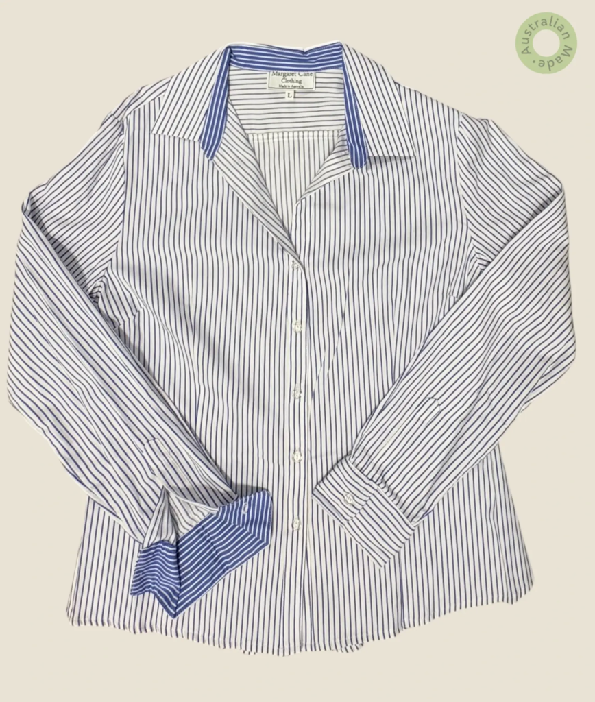 #508 – This shirt features a white base with fine indigo blue vertical pinstripes throu