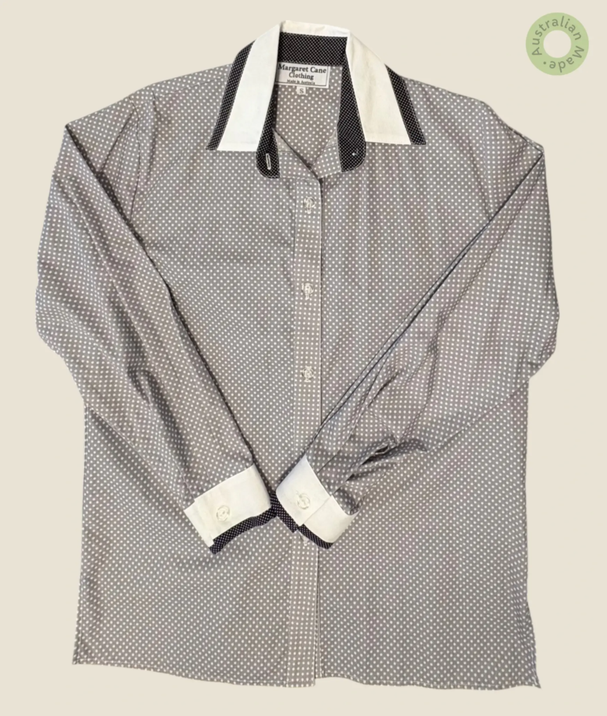 #285 – This shirt features a grey base with a dense white micro-polka dot pattern throu