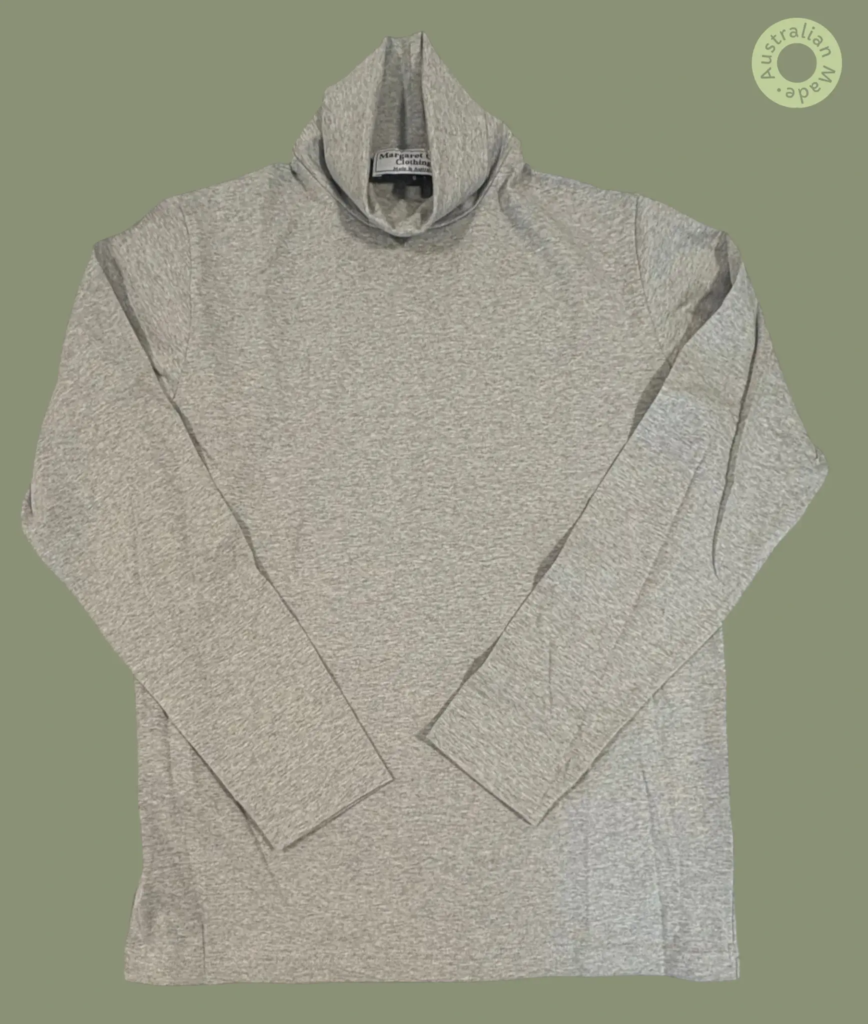 #603 – This top is a solid grey marle throughout the body, sleeves, and turtleneck. Pho