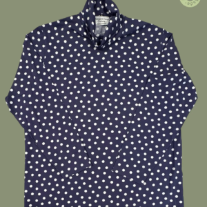 #608 – This top features a navy base with a white polka dot pattern throughout the body